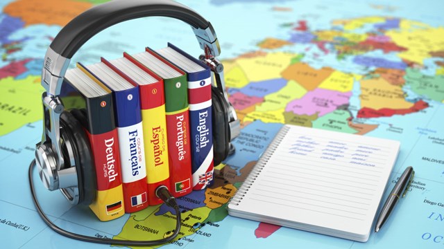 Language books and map.
